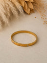 Pulsera dorada con punto de luz y detalles circulares bañado en oro 18k