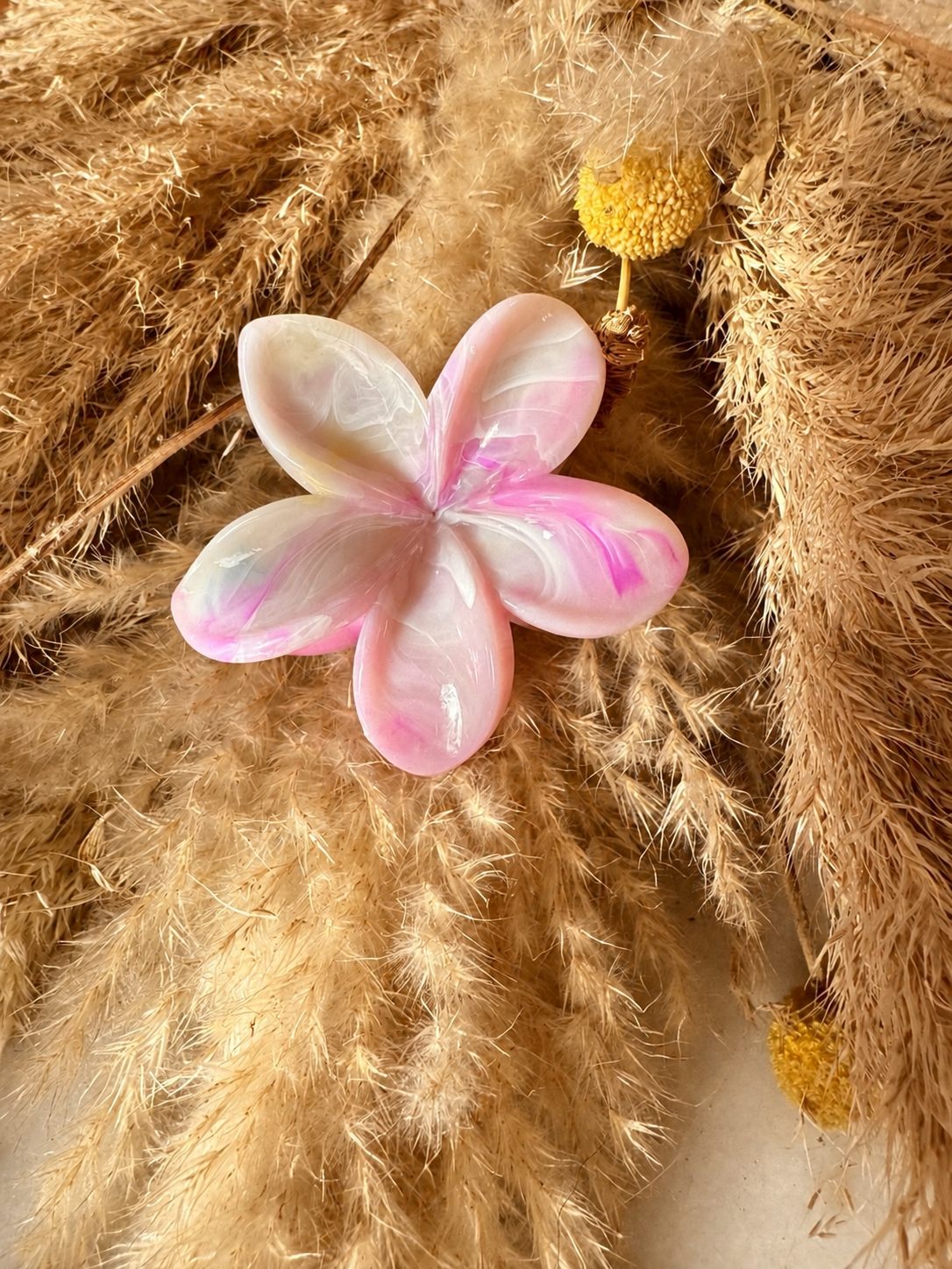 Pinche de flor en tonos