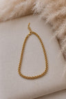 Collar cruzado grueso bañado en oro 18K