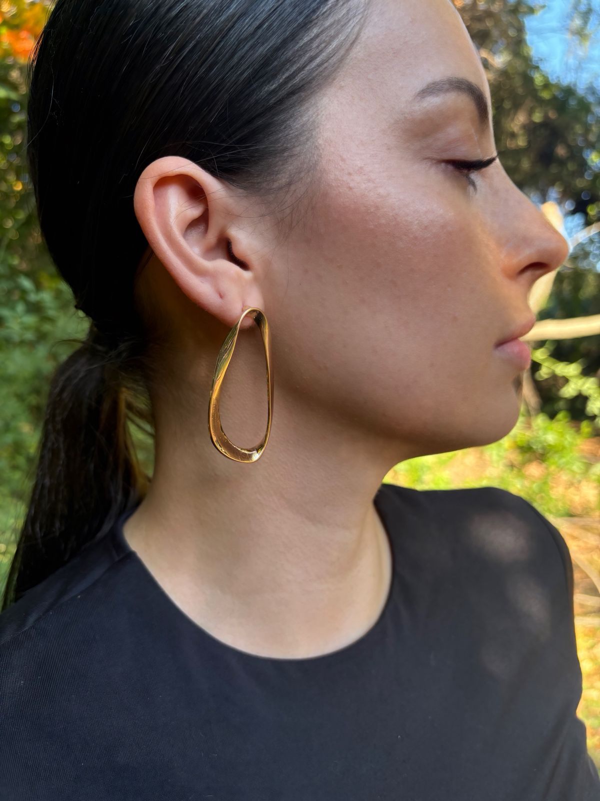 Aros ovalado en tono dorado