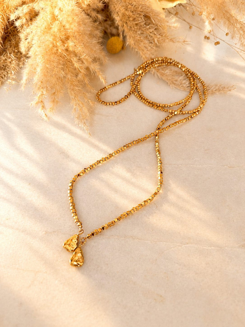 Collar abierto de mostacilla en tonos dorados
