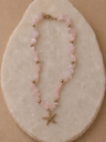 Collar de cuarzo rosa con estrella de mar colgante