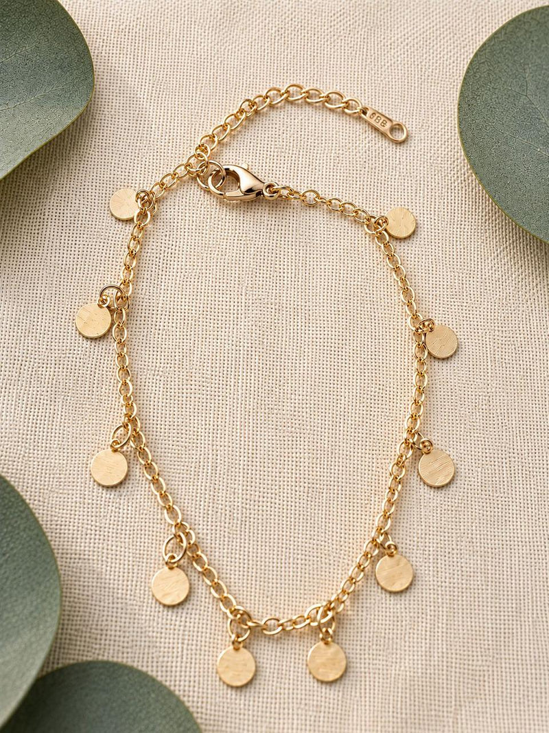 Pulsera dorada con detalles circulares bañado en oro 18K