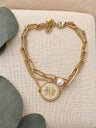 Pulsera de eslabones con doble cadena detalle de perlita y medalla
