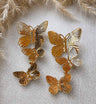 Aros colgantes mariposas doradas
